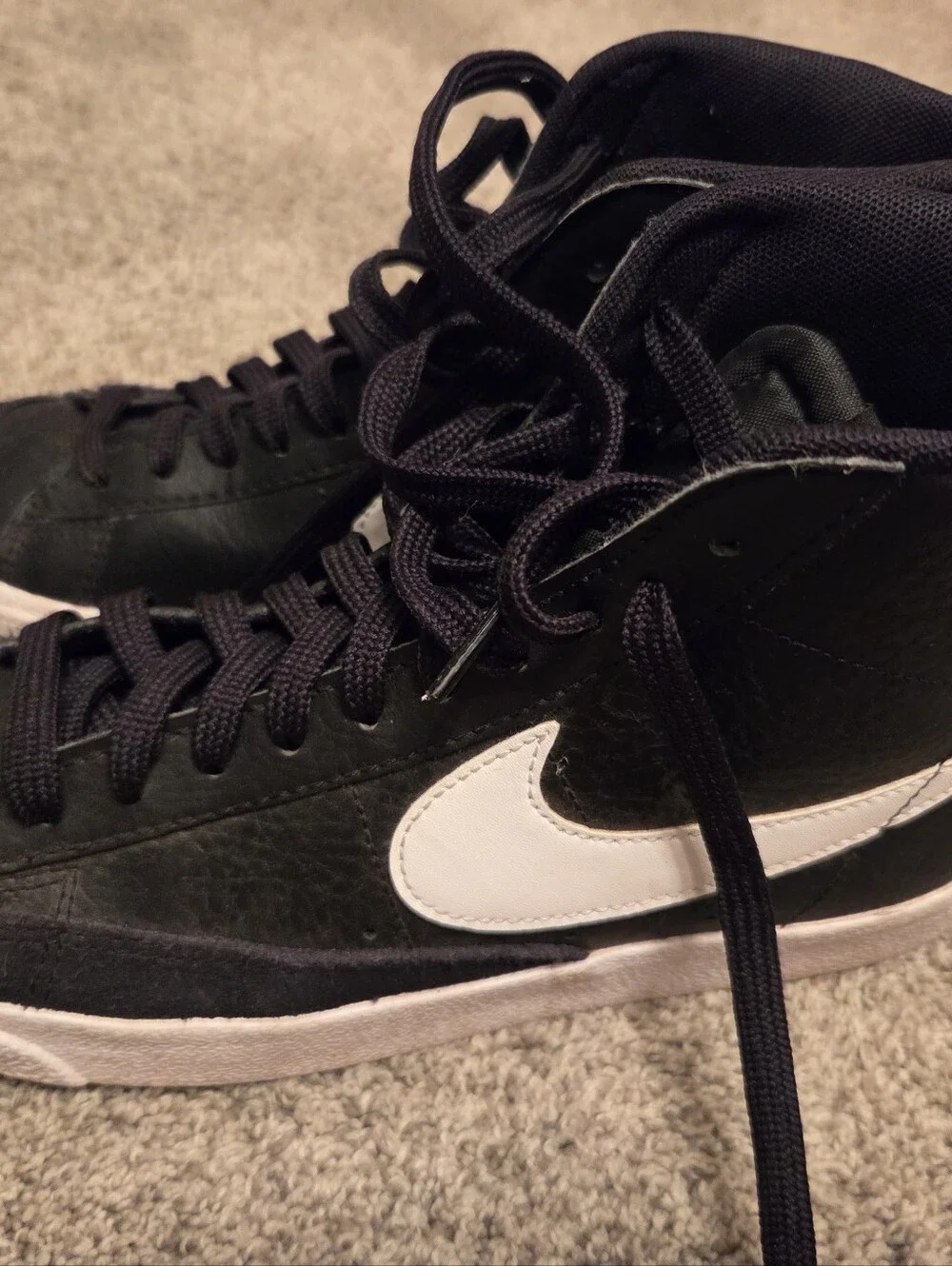 Nike Kids Black High-Top Sneakers with White Swoosh Accent